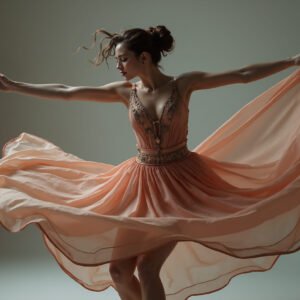 Dancer spinning with flowing clothes captured in graceful motion—ideal for dance, art, and dynamic design visuals