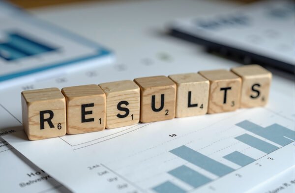 Wooden blocks spelling results on business charts