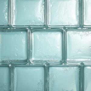 Photorealistic wall of clear glass bricks forming stacked blocks—modern architecture texture photo