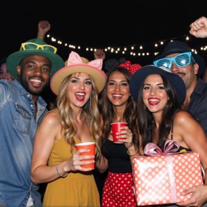 Group of happy friends celebrating together at party with joy and excitement