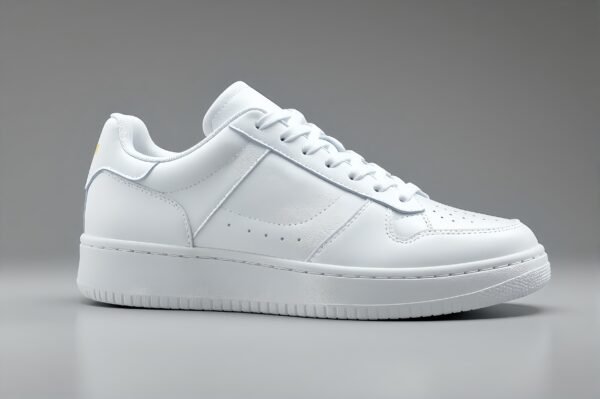 White leather sneaker with detailed stitching, modern casual shoe