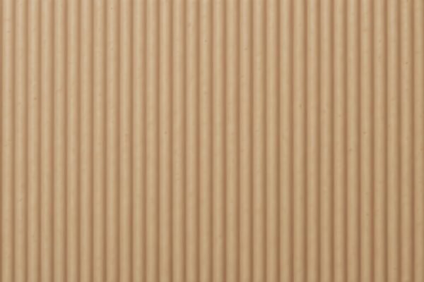 Close-up of corrugated cardboard box surface showing texture and brown material detail