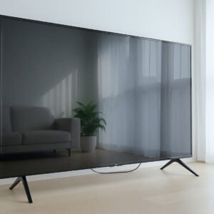 Modern 4K style TV on a simple stand black frame clean reflections blank screen no branding no text
