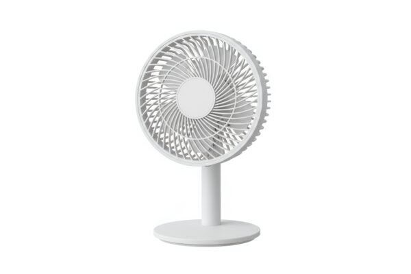 Small desk fan with circular design and front grille studio shot white background no labels or brand marks.