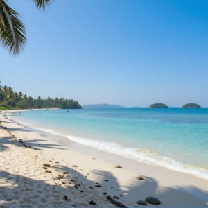 Tropical beach with turquoise ocean water and white sand sunny clear day