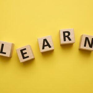 wooden blocks spelling learn l e a r n loosely arranged with different angople no logos no extra objectsspelling must be exact and clearly readable EcFk2MU upscaled