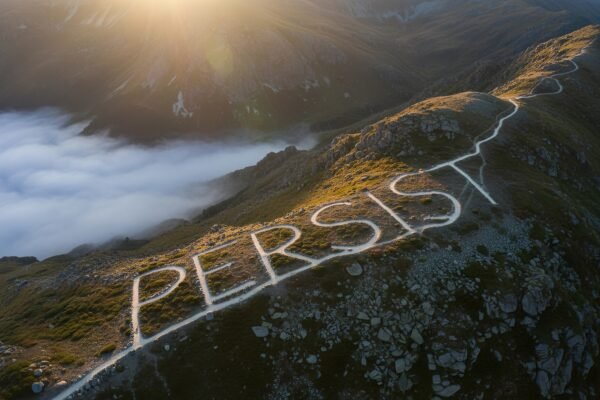 realistic cinematic landscape where a winding mountain hiking trail naturalistic photography style no people no logos word must be clearly readable xT8Pf QM upscaled
