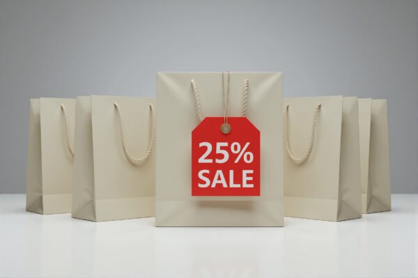 Download this 25% sale shopping bags image with bold red discount tag, perfect for retail promotions, ecommerce banners, and seasonal marketing campaigns.